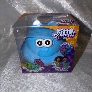 Blue Squeeze Kitty Squishy Toy - Bright Green, Hot Pink, and Sky Blue